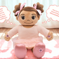 Madina Islamic Teaching plush toy sitting in a room, talking. Madina Muslim doll as a halal gift for kids