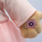 Close-up of Madinas hand, where you press to hear her speak.Islamic plush doll Madina teaching children dhikr and nasheeds