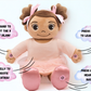 Toy with interactive parts and text instructions on a white background. Educational Islamic plush toy Madina designed for Muslim children