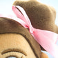 Doll close up go hair bun and bow. Cuddly Islamic doll Madina plush toy for kids learning Islam